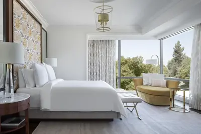 a bedroom with a white bed and a large window at Four Seasons Hotel Westlake Village in Westlake Village
