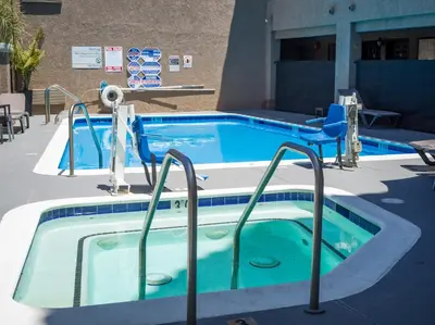 a swimming pool with a hot tub in a building at Quality Inn & Suites Camarillo-Oxnard in Camarillo