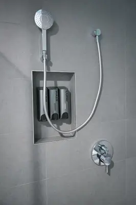 a shower with a shower head in a bathroom at Tilbury Inn in Glendale