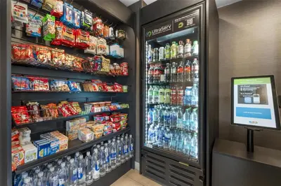 a drink refrigerator in a store with soda at Best Western Plus Pavilions in Anaheim