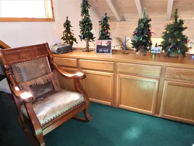a room with a desk with christmas trees on it at Dream Getaway-Secluded Hot Spa-Walk to Village-Walk to Pineknot Trailhead-Plus King Bed! in Big Bear Lake
