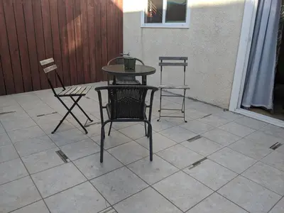 a table and two chairs on a patio at 2Bedroom with Den and 2BA 4 Blocks to Santa Monica Beach in Los Angeles
