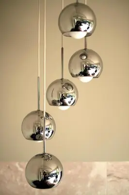 a group of silver lights hanging from a ceiling at Venice Place in Los Angeles