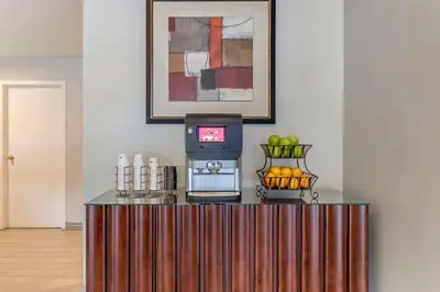 a counter top with acomputer on top of it at Best Western Plus Executive Inn Rowland Height City of Industry in Rowland Heights