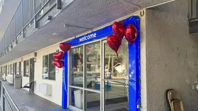 a store front with red heart decorations in front of it at Motel 6-Big Bear Lake, CA in Big Bear Lake