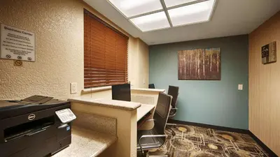 an office with a desk and a computer in it at Best Western San Dimas Hotel & Suites in San Dimas