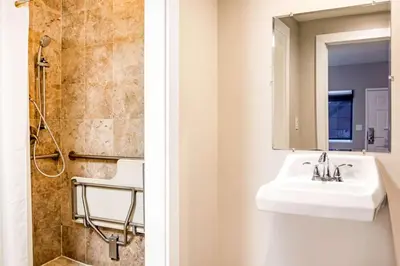 a bathroom with a sink and a shower at Rodeway Inn near Melrose Ave in Los Angeles