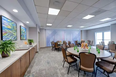 a conference room with a table and chairs in it at Hilton Garden Inn Anaheim/Garden Grove in Anaheim