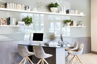 a office with a desk with chairs and a computer at AC Hotel by Marriott Los Angeles South Bay in Los Angeles