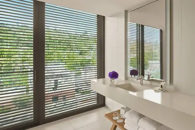 a bathroom with a sink and a large window at The West Hollywood EDITION in Los Angeles