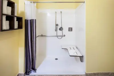 a bathroom with a shower with a shower curtain at La Quinta by Wyndham Inglewood in Inglewood