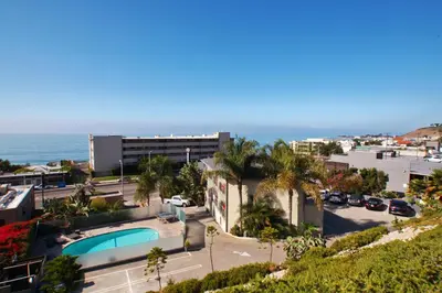 a view of a city with a building and the ocean at The M Malibu in Malibu