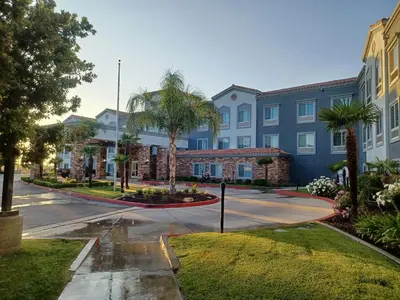 an empty street in front of a building at Spark By Hilton Redlands in Redlands