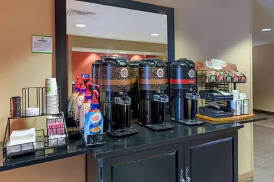 a counter in a hotel room with a drink at Extended Stay America Suites - Los Angeles - Chino Valley in Chino