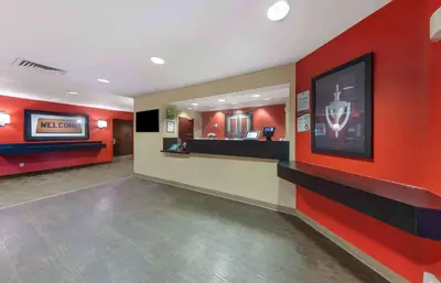 a waiting room at a hospital with red walls at Extended Stay America Suites - Los Angeles - Chino Valley in Chino