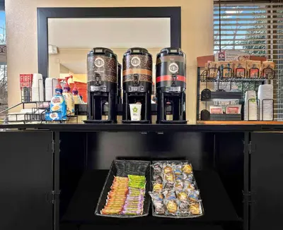 a shelf with drinks and food on it at Extended Stay America Suites - Los Angeles - Valencia in Stevenson Ranch
