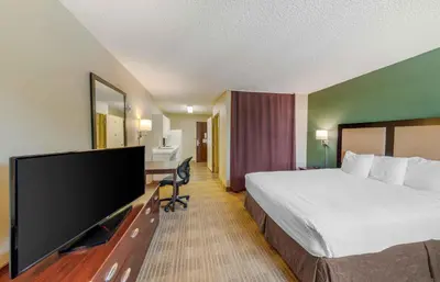 a hotel room with a bed and a flat screen tv at Extended Stay America Suites - Los Angeles - Simi Valley in Santa Susana Knolls