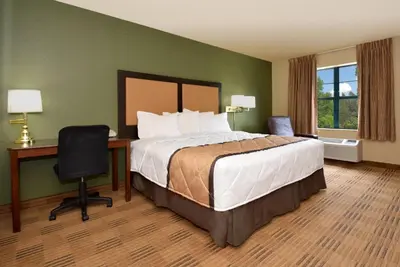 a hotel room with a bed and a desk at Extended Studio Hotel Suites - Los Angeles - San Dimas in San Dimas