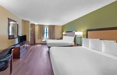 a hotel room with two beds and a flat screen tv at Extended Stay America Suites - Los Angeles - Arcadia in Arcadia