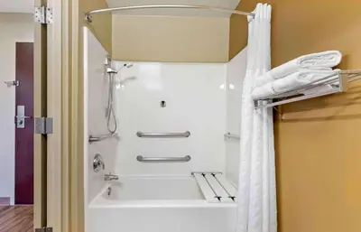 a shower in a bathroom with a white shower curtain at Extended Stay America Suites - Los Angeles - Arcadia in Arcadia