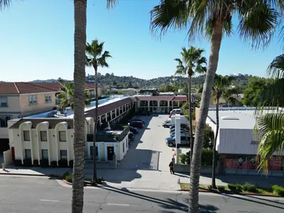arial view of a hotel with palm trees at Chariot Inn Glendale - Pasadena in Glendale