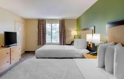 a hotel room with a bed and a television at Extended Stay America Suites - Los Angeles - LAX Airport - El Segundo in El Segundo
