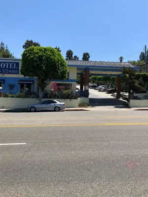 a car parked on the side of a street at King Lodge Motel in Monterey Park