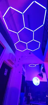 a room with a blue and purple lights at Artist Housing - Downtown in Los Angeles