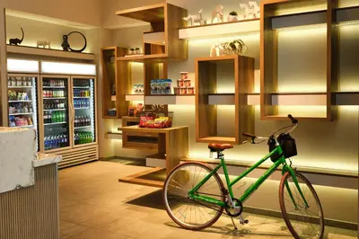 a green bike is parked in a store at Element Anaheim Resort Convention Center in Anaheim