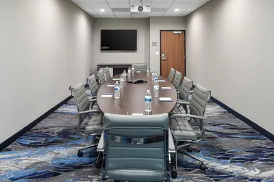 a conference room with a long table and chairs at Fairfield Inn & Suites by Marriott Moorpark Ventura County in Moorpark