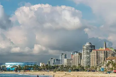a skyline of a city with a beach and buildings at Mid-Mod Retro Private Studio & Pool in Long Beach