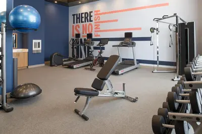 a gym with several exercise equipment in a room at Hampton Inn by Hilton North Hollywood in North Hollywood