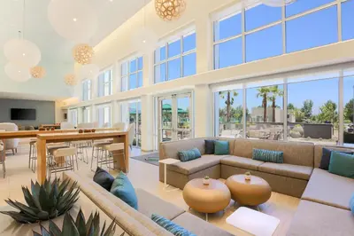 a large living room with a couch and a table at Element Ontario Rancho Cucamonga in Ontario