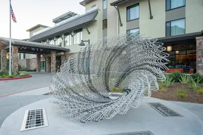 a metal sculpture in front of a building at TownePlace Suites by Marriott Thousand Oaks Agoura Hills in Agoura Hills
