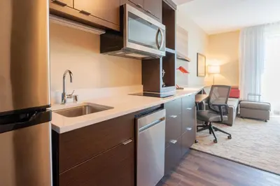 a kitchen with a sink and a desk in a room at TownePlace Suites by Marriott Thousand Oaks Agoura Hills in Agoura Hills