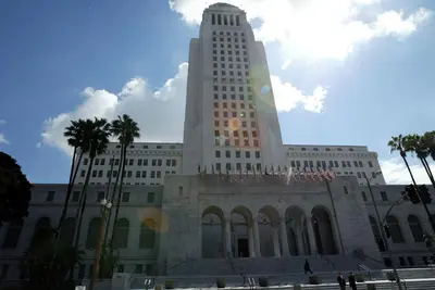 a large building with a tower on top of it at Metro Plaza Hotel in Los Angeles