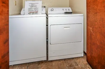a stove and a refrigerator in a room at Breezy Two-113 by Big Bear Vacations in Big Bear Lake