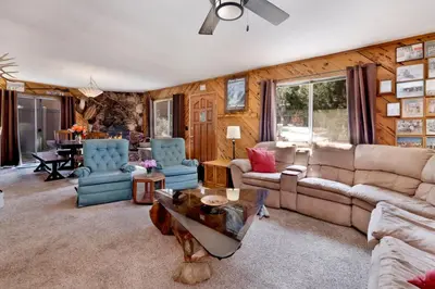 a living room with a couch and chairs and a table at Popko's Place Resort Chalet by Big Bear Vacations in Big Bear Lake