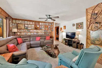 a living room with a couch and chairs and a tv at Popko's Place Resort Chalet by Big Bear Vacations in Big Bear Lake