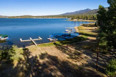 a view of a lake with boats in the water at Lakeside Family Cabin by Big Bear Vacations in Big Bear Lake