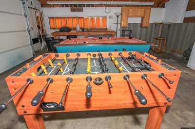 a wooden table with a bunch of tools on it at Cozy up to Summit-1651 by Big Bear Vacations in Big Bear Lake