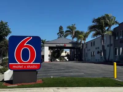 a sign in front of a mobil gas station at Motel 6-Carson, CA in Carson