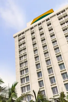 a large building with a rainbow on top of it at Hotel June West LA, a Member of Design Hotels in Los Angeles