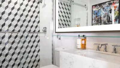 a bathroom with a sink and a mirror at Montrose at Beverly Hills in Los Angeles
