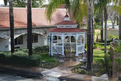 a gazebo in the yard of a house at Dynasty Suites Redlands in Redlands