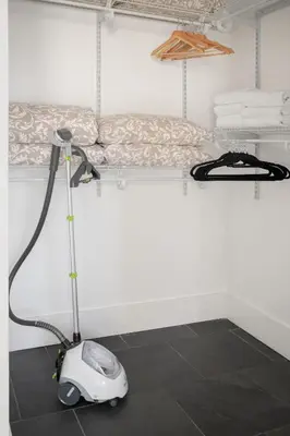 a room with a scooter on the floor next to a bed at Angel City 1 bedroom Apartment in Los Angeles