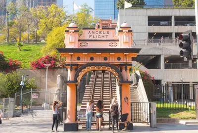a group of people standing in front of a gate at Angel City 1 bedroom Apartment in Los Angeles
