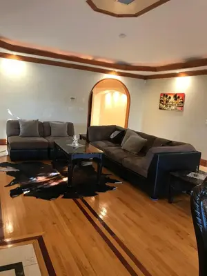 a living room with a couch and a table at Luxurious 3 BD in Culver City with POOL &HOT SPA in Los Angeles