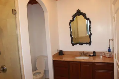 a bathroom with a sink and a mirror on the wall at Luxurious 3 BD in Culver City with POOL &HOT SPA in Los Angeles