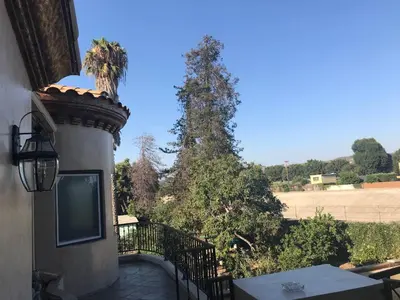 a balcony of a house with a view of a field at Luxurious 3 BD in Culver City with POOL &HOT SPA in Los Angeles